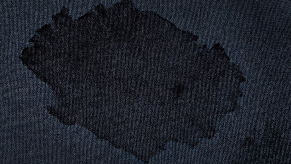 assess stain and fabric reaction